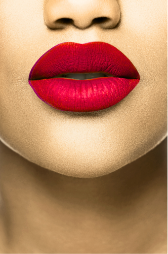 Close-up of a person's lips with bright red lipstick on a beige background